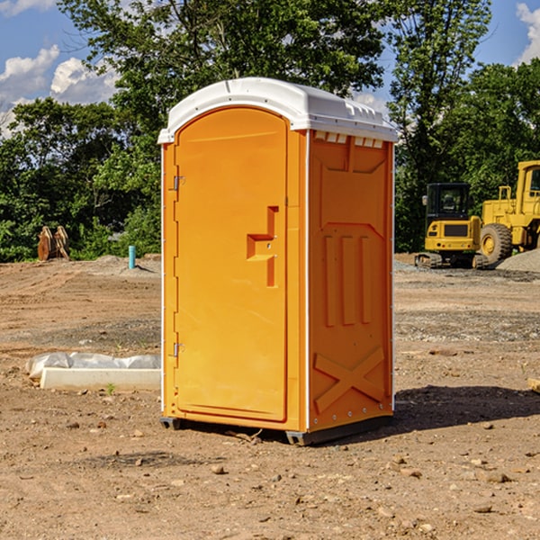 what is the cost difference between standard and deluxe portable restroom rentals in Campton